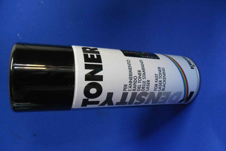 Toner density spray